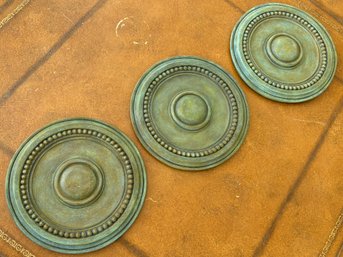 A Trio Of Copper Toned Wall Plaques