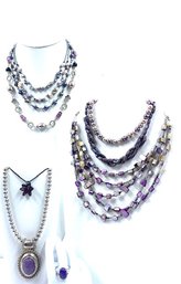 Collection Of Purple Accented Jewelry Including Shell, Faux Pearl, Rhinestones, & More - 9 Pieces