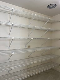 A Set Of Plastic Coated Wire Racks By Closet Maid - His Dressing Room