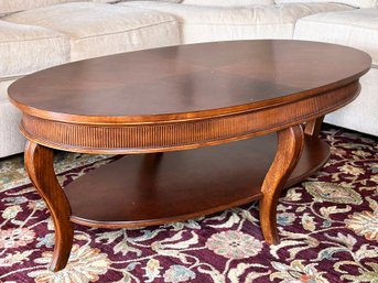 An Oblong Inlaid Marquetry Coffee Table By Lexington Furniture