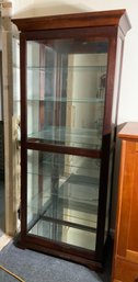 Tall Cherry Glass Lighted Curio Cabinet With Sliding Door