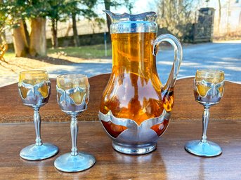 A Vintage Amber Glass Pitcher And Set Of 3 Goblets