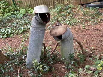 Assemblage Garden Art: A Whimsical Pair Of Worm-Like Figures In Metal