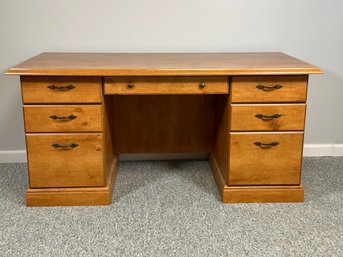 A Contemporary Executive Desk In Knotty Pine