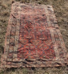 Room Sized Antique Middle Eastern Tribal Rug With Low Pile And Primary Color Palette
