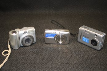 Group Of Three Vintage Digital Camera's From Olympus, Polaroid & Canon