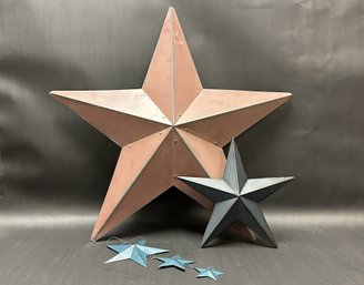 A Grouping Of Rustic Tin Stars