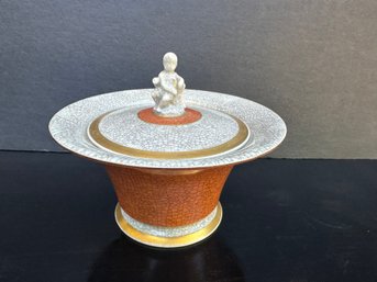 Royal Copenhagen Terracotta Crackle Glaze Pot With Grey Crackle Glaze Lid Adorned With Figural Cupid