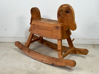 A Vintage Handcrafted Rocking Horse In Pine