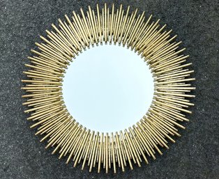 A Modern Indian Brass Sun Form Mirror