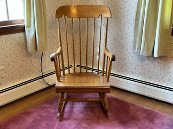 A Vintage Rocking Chair In A Traditional Style By Nichols & Stone