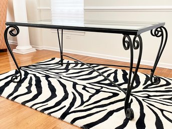 A Wrought Iron Glass Top Dining Table