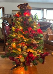 Adorable Decorated With Fruits, Flowers, Leaves Christmas Tree Small Wooden Base With Lighting.