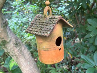 A Charming Terracotta Bird House