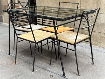 A Beautiful Mid Century Modern Wrought Iron Glass Top Dining Table And Set Of Chairs, Likely Salterini, 1960's