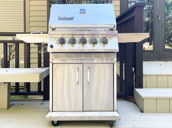 A Ducane Stainless Steel Propane Grill With Side Burner, Rotisserie, And More