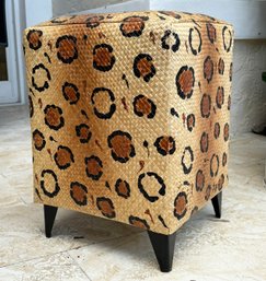 A Straw Ottoman With Painted Animal Print