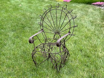 Garden Decor: A Miniature Chair In Wire