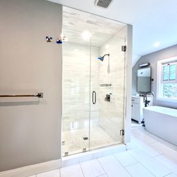 A 46.5' Frameless Glass Shower Enclosure - Polished Nickel Hardware - Primary Bath