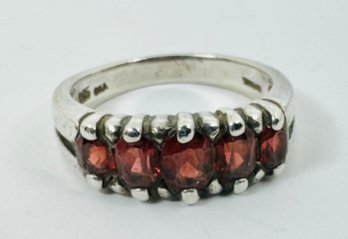 STERLING SILVER AND 5 STONE GARNET RING