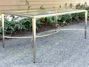 A Modern Chrome And Glass Coffee Table By Restoration Hardware