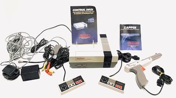 Complete Vintage Nintendo Entertainment System Including Booklets, Wires, & Zapper