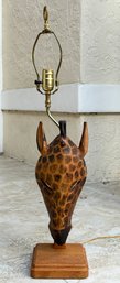 A Hand Carved Kenyan Giraffe Mask Lamp