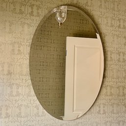 An Oval Bevelled Mirror