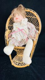 Doll With Wicker Chair