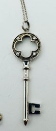 STERLING SILVER KEY WITH CZ ACCENTS NECKLACE