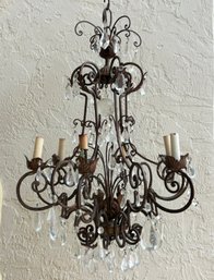 A Vintage Wrought And Crystal Chandelier