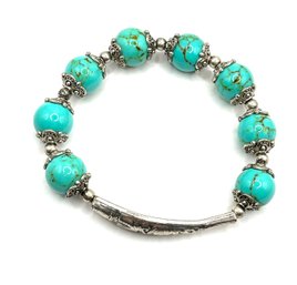 Ornate Etched Fish Piece And Turquoise Color Beaded Bracelet