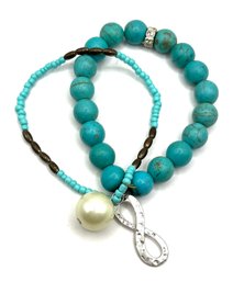 Turquoise Color Beaded Two Strand Bracelet With Charms