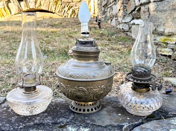 A Trio Of Antique Oil Lamps