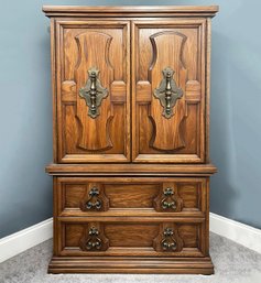 A Paneled Fruitwood Spanish Revival Gentleman's Chest