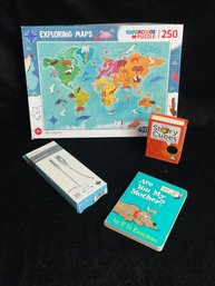 Assorted Items: Map Puzzle, Book, Story Cubes And USB Cable