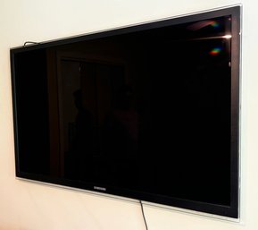 A Samsung 55 Inch Flat Screen TV