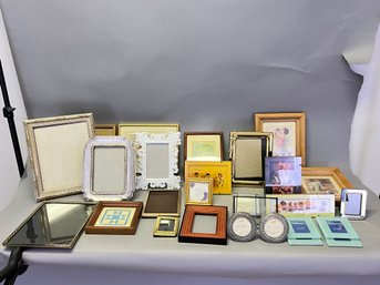 Table Lot Of Picture Frames