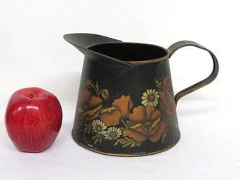 A Tole Decorated Tinware Pitcher