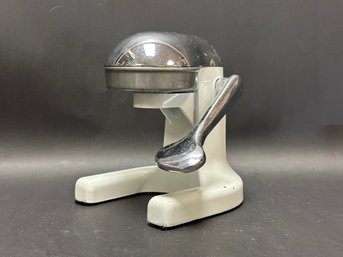 A Vintage Countertop Juicer In Enamel & Chrome