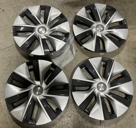 4 Brand New Tesla Hubcaps