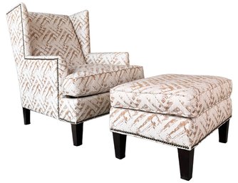 A Beautiful Modern Armchair And Ottoman With Nailhead Trim By Broyhill Furniture