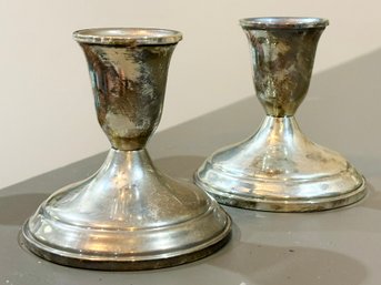 A Pair Of Towle Weighted Sterling Silver Candlesticks