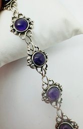 GORGEOUS STERLING SILVER AND AMETHYST DECORATIVE LINK BRACELET