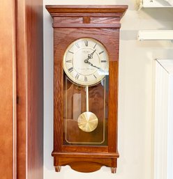 An Oak Wall Clock By Seiko