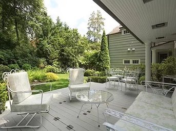 A Pair Of Vintage Woodard Orleans Wrought Iron Arm Chairs/rockers And A Round Table