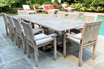 An Extendable Dining Table And Set Of 12 Arm Chairs By Regal Teak (AS IS)