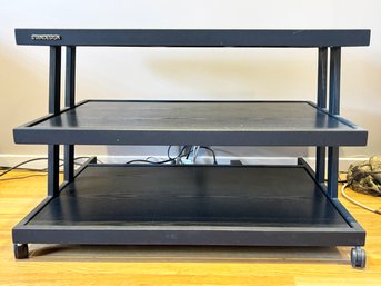 A Modern Metal And Wood Media Stand