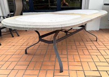 A Large Outdoor Dining Table By Tropitone