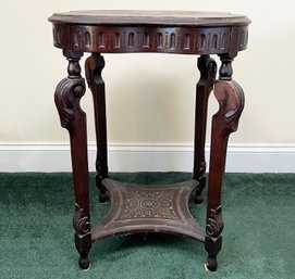 A Vintage Carved Mahogany Side Table